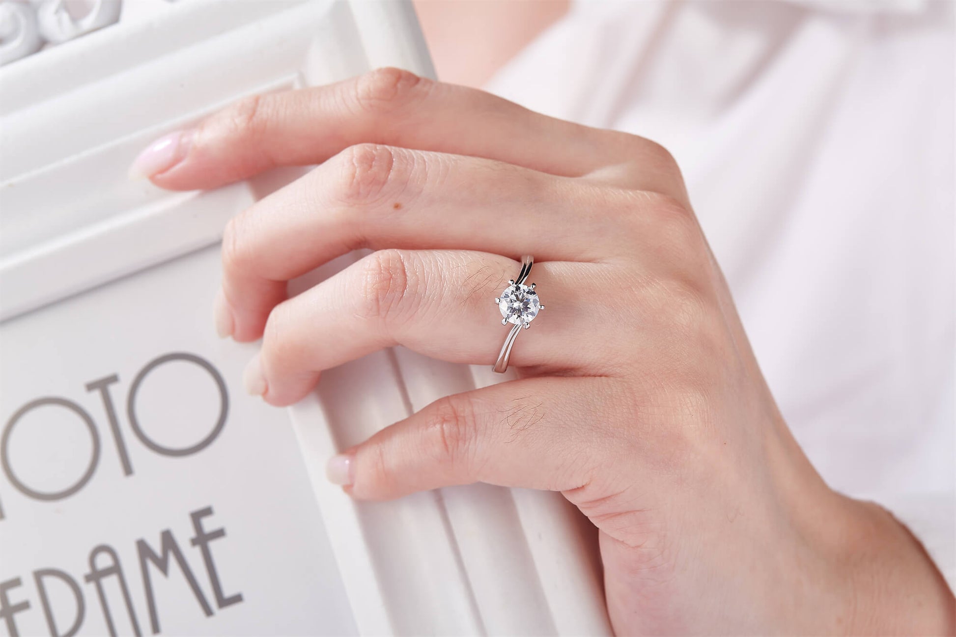 1 CT. round Moissanite Ring on hand IMG 1