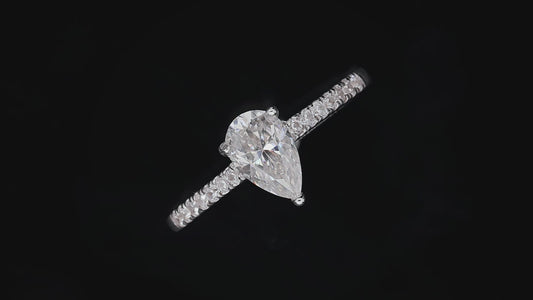 1 CT. Pear Cut Moissanite Pavé set Engagement Ring